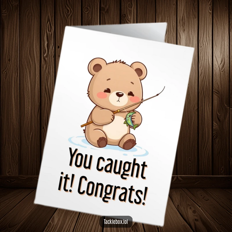 Funny Free Printable Congrats Card: Joyful bear cub proudly displays a shimmering fish caught on his tiny fishing rod.
